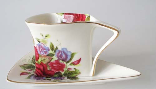 Limoges Tasse mit Untertasse Rosendekor handgemalt