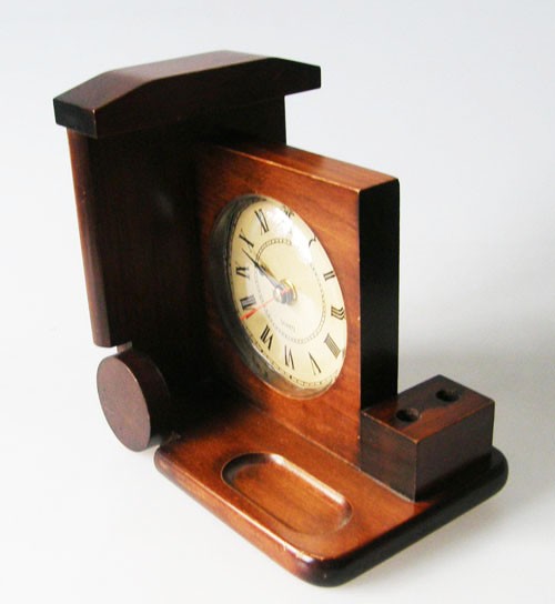 schöne alte Buchstütze aus Massivholz mit Uhr und Stiftehalter